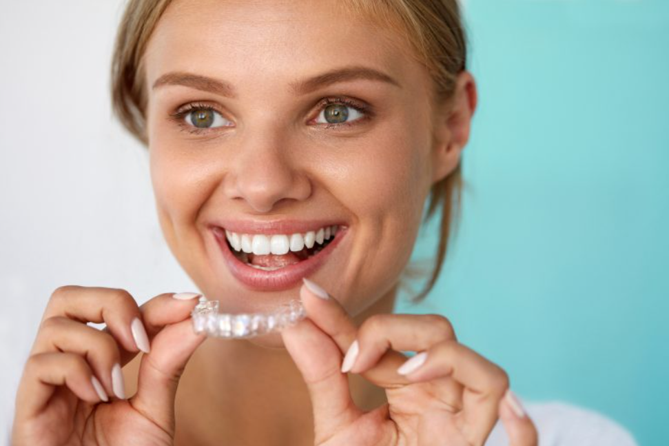 A beautiful lady wearing her Invisalign