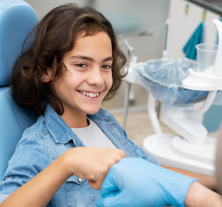 A Happy teen at dentist’s office