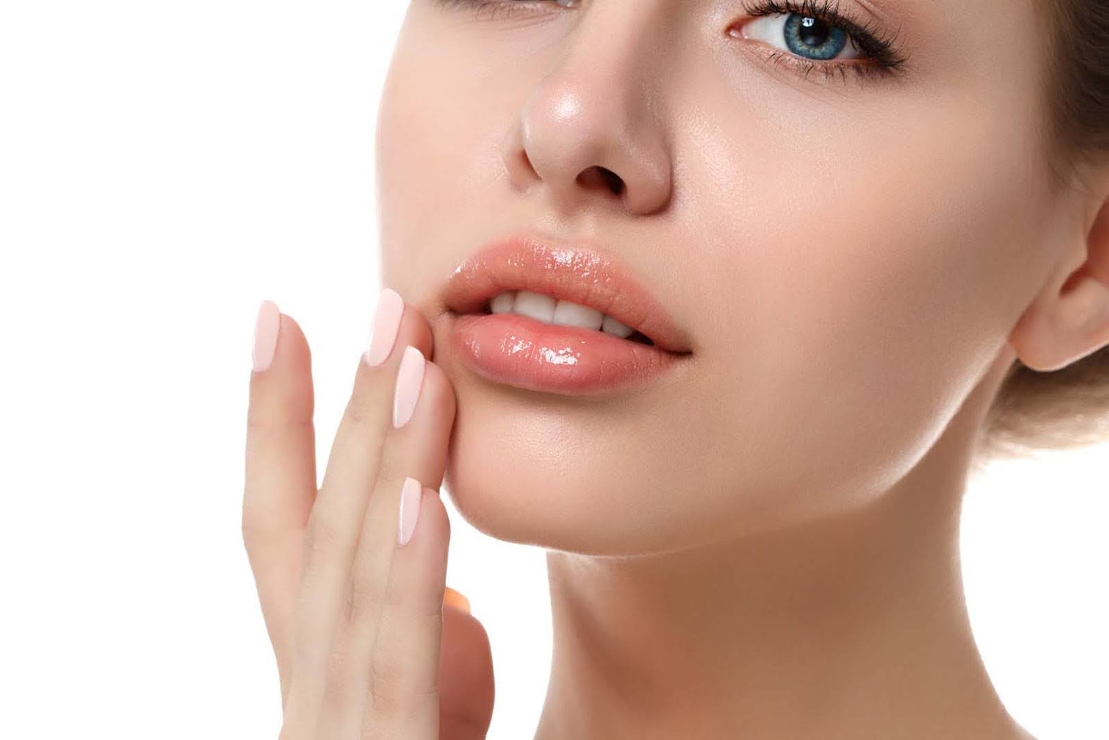 A beautiful woman with plump lips from our lup plumping treatment