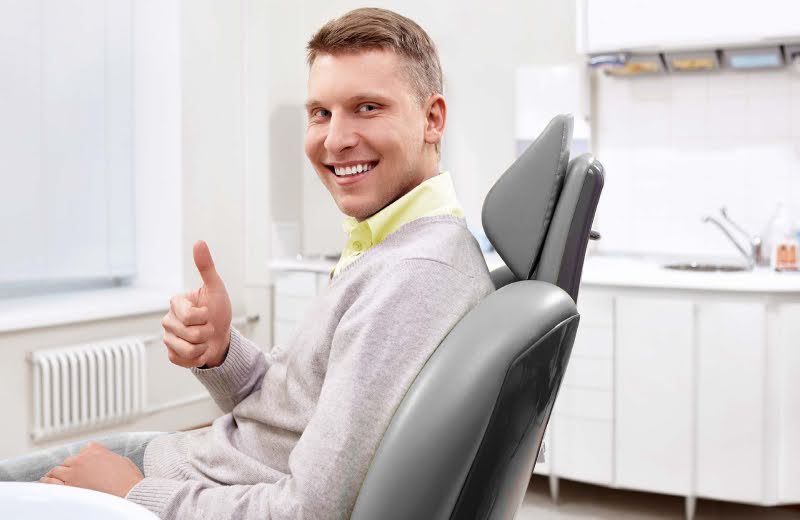 A Happy Patient Before a Biologic Dentistry Procedure