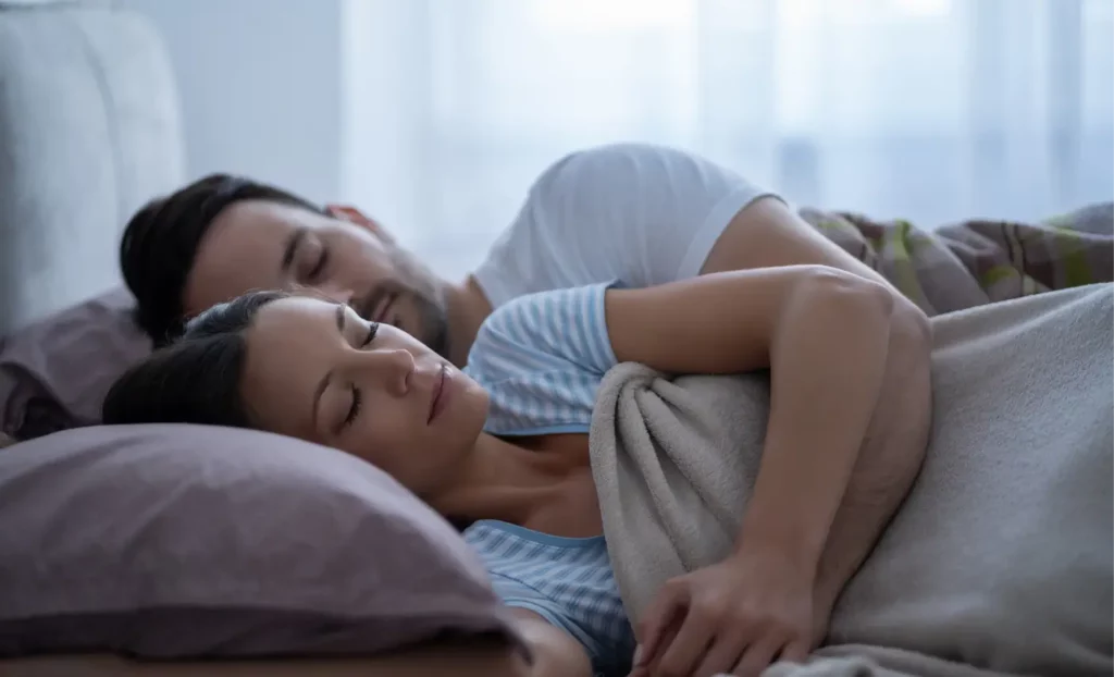 A Couple Having a Peaceful Night's Sleep After Nightlase Sleep Apnea Treatment