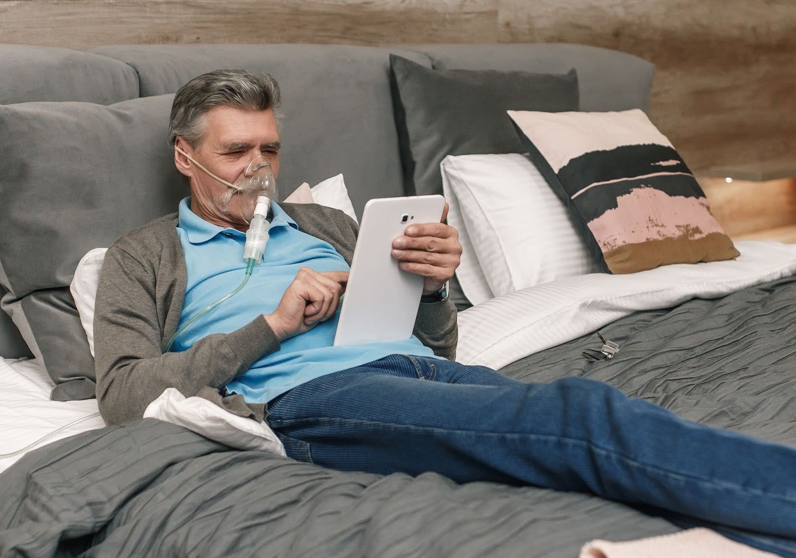   Senior male using CPAP machine to help sleep