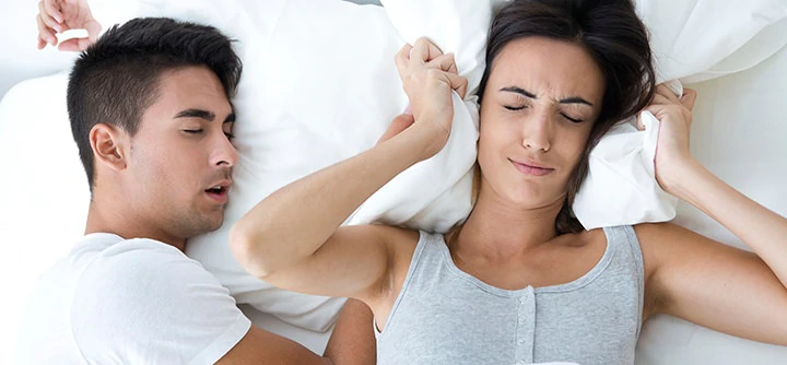 A Husband Annoying His Wife With Loud Snoring
